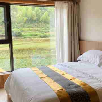 Zhuang YuanJu Homestay Rooms