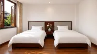 Deyuan Inn (Tea Horse Ancient City Branch) - Posadas
