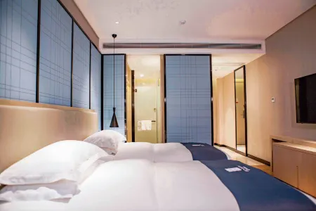 Echarm Hotel (Dongxing Port Municipal Government) Отели рядом с достопримечательностью «Chen Mansion»