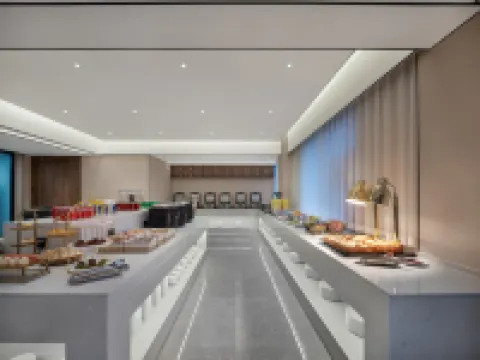 Mo Shang Qing Ju Hotel (Quliang Garment Industrial Park, South University Road, Zhengzhou) Hotel a Xinmi