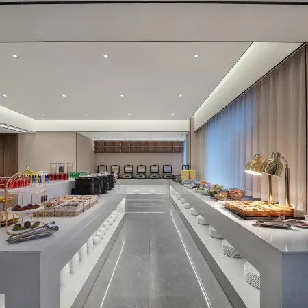Mo Shang Qing Ju Hotel (Quliang Garment Industrial Park, South University Road, Zhengzhou)