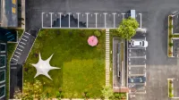 Baocheng Zhixuan Hotel (Luoshan Dingsheng Plaza Branch) - parcheggio