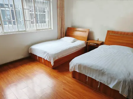 Longling Rujia Apartment Отели в г. Лунлинь