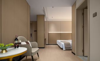 Yiyang Qianyi Hotel (North Branch of City College)