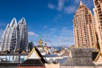 Naxin Hotel (Xishuangbanna Jinghong Gaozhuang XishuangjingStarlight Night Market)