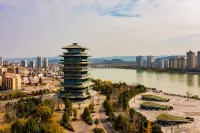 Orange Hotel (Hanzhong Mian County Mianshuiwan Plaza) - parcheggio
