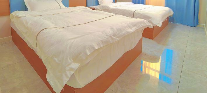 Du Jia Homestay Hotéis em Wusu