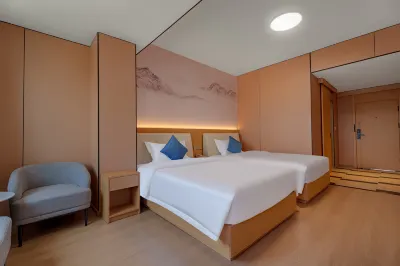 Junjing Hotel  Chengdu Happy Valley Branch Hotel berhampiran Huanghua Commercial Street