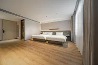 ジンジャンインホテル（嘉峪関大唐美食街市役所） 嘉関市体育中心-総合館周辺のホテル