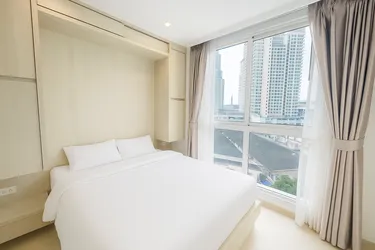 รูปภาพของอพาร์ทเมนต์โอลิมเปียในตัวเมืองพัทยา สระว่ายน้ําชุมชนวงแหวน