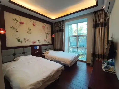 Miler Jinquan Hotel (Huquan Ecological Park) Hotel di Mil