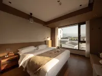 Jiuhuashan Xinyuan Homestay (Jiuhuashan Tourist Service Center Branch) - ห้องครัว