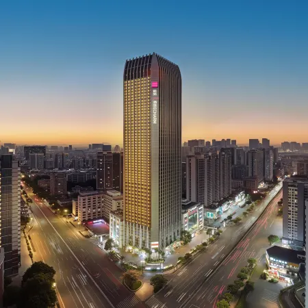 ECHARM PLUS Hotel (Guangzhou Dart International Center Changgang Metro Station) Отели рядом с достопримечательностью «Стадион «Яньцзыган»»
