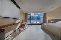 DaLi Jiuyu · Seaside and Mountain View at Dusk · Courtyard Vacation Boutique Stay (Erhai Lake) - balcony