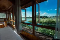 Puzhehei Riverside Inn - Parkplatz