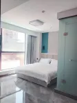 Longyuan Hotel (Xinyang Xiaominghe Park Minggangzhen No.2 Junior High School Branch) Hotels near Minggang East  Railway Station