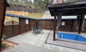 Jiuhe Yunshan Quanju Hot Spring Wooden House B&B