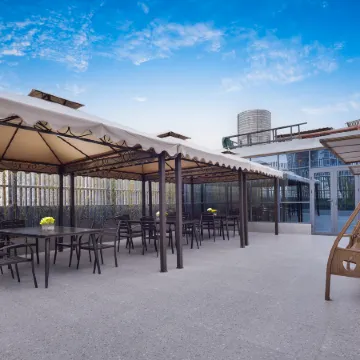 Y · SJHOTEL · Four Seasons Hotel (Longyuan Subway Station Store) Отели рядом с достопримечательностью «Рынок 5 Союзов»
