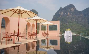 Mango Inn Mitang Family Resort Hotel (Yangshuo Shilihualang Yulong River Branch)