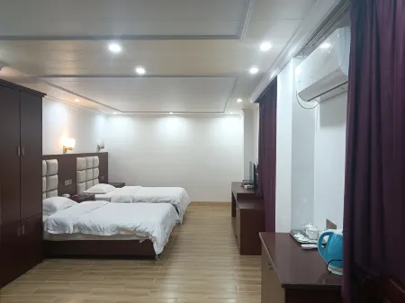 Wuhua Huayue Hotel Отели рядом со станцией Huacheng Railway Station