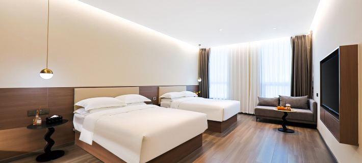 Nanshe Designer Hotel | Nan's Hotel (Yanji Yanbian University West Market Branch) Hotels in Yanji