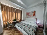 Xiaocheng Gushi Unmanned Homestay (Yixiu District Government University Town) - مطابخ