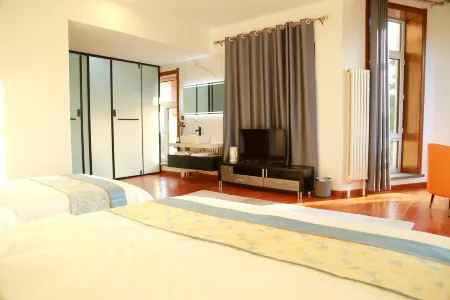 Wu Xu Boutique Hotel (Yabuli Ski Tourism Resort Отели рядом с достопримечательностью «Yabuli Sightseeing Cable Car and World's No. 1 Slide»