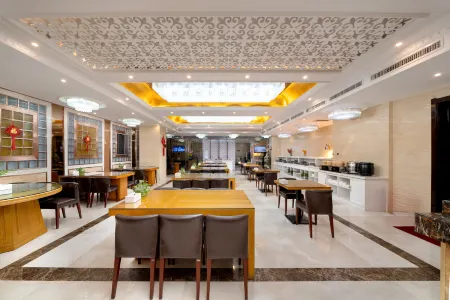 Wanda Spring Business Hotel (Daqing Sa'ertu Wanda Plaza) Отели рядом с достопримечательностью «Daqing Times Square»