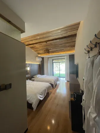 Weihui Huaqigu Homestay Отели рядом с достопримечательностью «Paomaling»