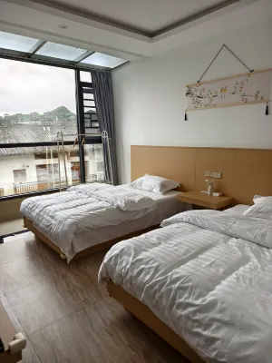 Flower Language Inn (Baili Rhododendron Stone Cow Town Store)