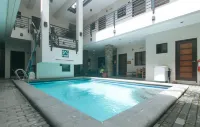Elyseah Condotel by RedDoorz - ที่มีสระว่ายน้ำ