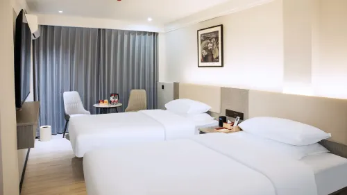 Huaqiao Smart Boutique Hotel (Quannan County Zhanqian Road) - พร้อมWifi