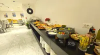 Royalis Suites Rafailovici - Beachfront Sea View Apartments - breakfast