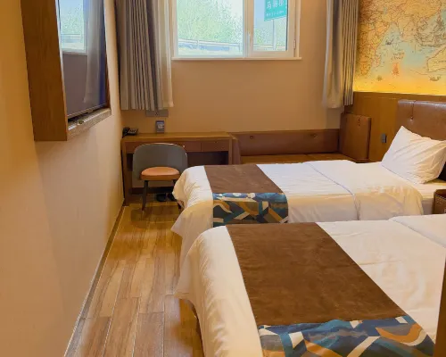ZK Hotel (yizhuangjingjikaifaquMaqiqiao Branch) Zimmer Photos