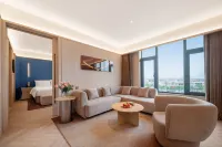 Ruoqiang Orange Crystal Hotel