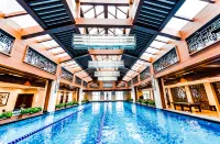 Hawaii International Hotel Hôtels à : Mudanjiang