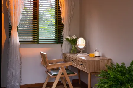 Alieti Rainforest Secret Garden Отели рядом с достопримечательностью «Menghanman Tingfota Temple»