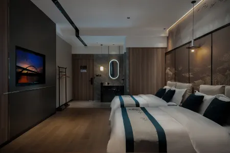 Junyong Hotel (Qijiang Wanda Plaza) Отели рядом с достопримечательностью «Chongqing Foreign Languages and Foreign Affairs College (Qijiang Campus)»