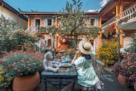 GUANXIN · Half a Mile | Monet Garden Inn Monet Garden