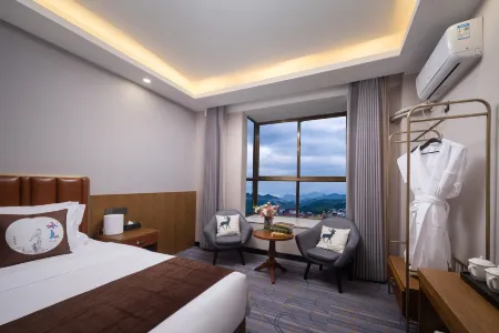 Elong Wanguo Hotel (Xishuangbanna Daizuyuan) Отели рядом с достопримечательностью «Menghanman Tingfota Temple»