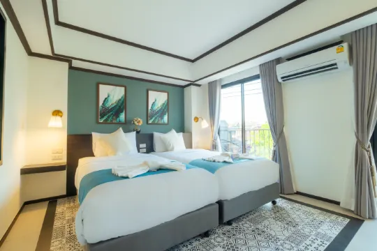 ห้องดีลักซ์เตียงแฝดปลอดบุหรี่