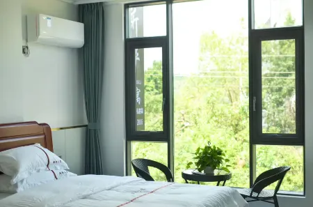 Xinye Apartment Отели рядом с достопримечательностью «Wanlü Lake · Wanlü Valley Resort»