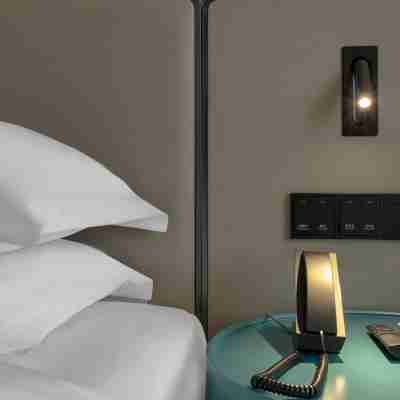 柏曼酒店(興業高鐵站商業街店) Rooms