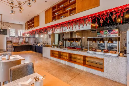 Seven International Service Apartment (Tianjin Binhai New Area Teda MSD Store) Отели рядом с достопримечательностью «Taida Financial Plaza E3AB»