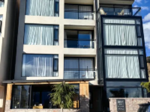 Deqin Meili Guanyun Banshan Hotel (Wunongding) โรงแรมใกล้จุดชมวิวด้านบนหมอกหนา