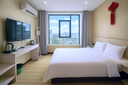 Jinniu Business Hotel (Jiangyou Station Huopao Street) Отели рядом с достопримечательностью «Buddha Cave Cave»