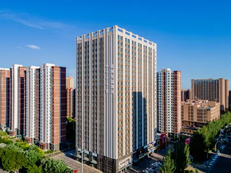 Uhome Hotel Hohhot Golden Bridge Отели рядом с достопримечательностью «Inner Mongolia University Innovation College (South Campus)»