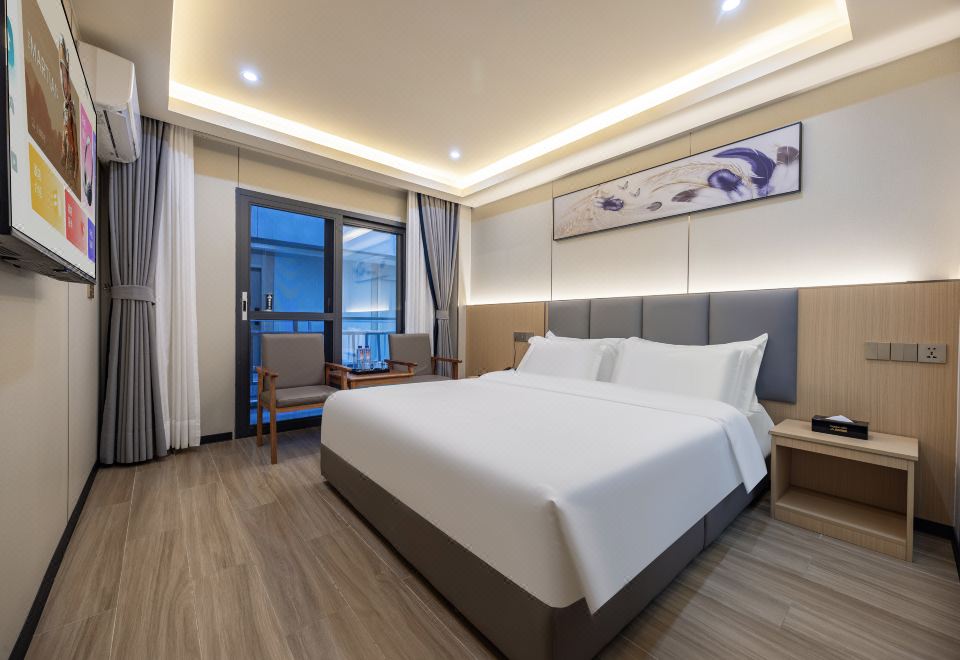 Yaduo New Hotel의 깨끗한 침실 모습