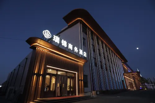 Ruijin Business Hotel Hotels in Hanggin Rear Banner