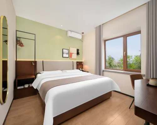 Home Inn UP Huayi Collection Hotel (Daqing Ranghulu District Normal College) Hotel di Daqing